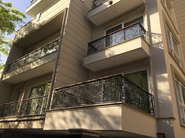 Bronze Scroll Facade Rail