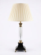 Crystal Column Corinthian Table Lamp, a crystal and brass and fabric table lamp, studio photograph on a white background