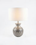 Repoussé Silver Surahi Table Lamp, a brass and fabric table lamp, studio photograph on a white background