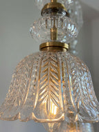 Close-up of the antique detailing on the Crystal Bell Pendant chandelier