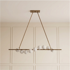 Vela Brass Globe Chandelier unlit