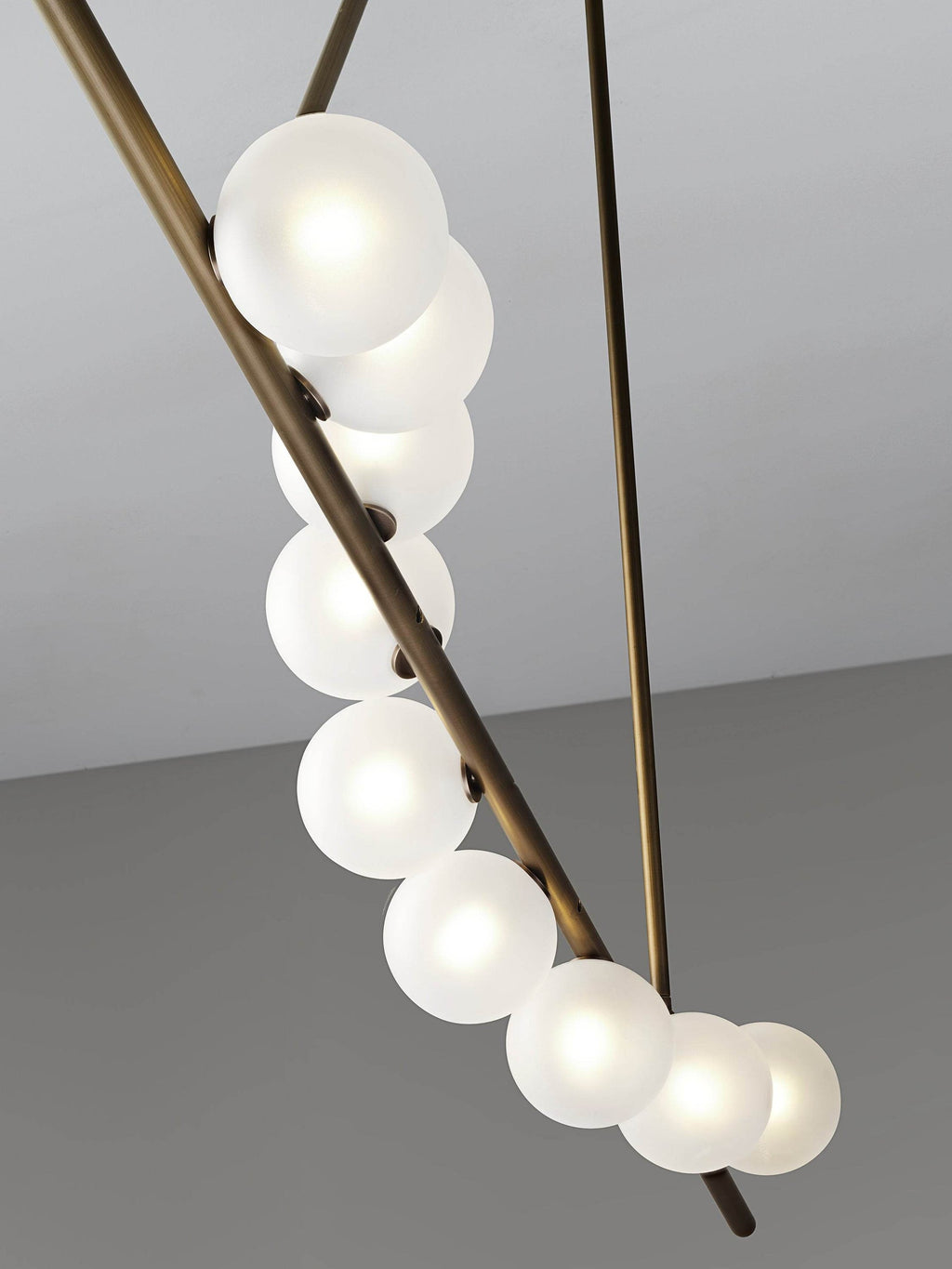Vela Brass Globe Chandelier interior view