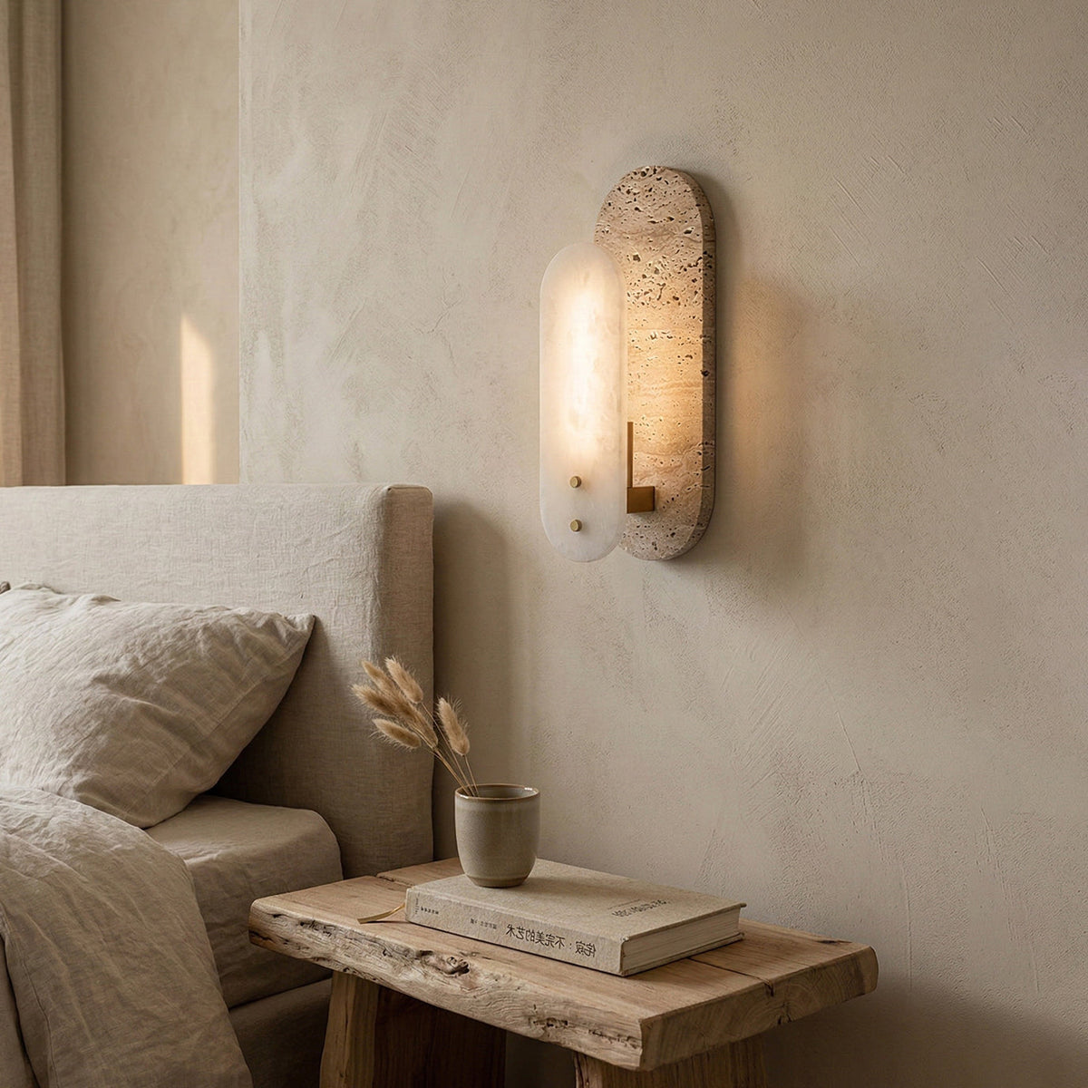 Ellisse travertine and alabaster wall light detail
