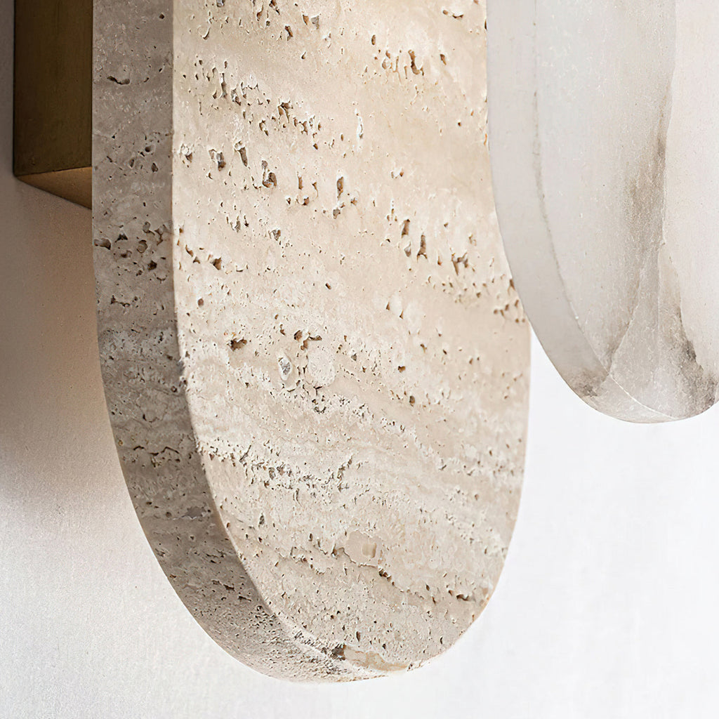 Ellisse natural stone wall light in interior setting