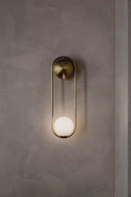 Offset Globe Brass Wall Light lifestyle view