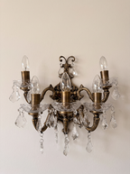 Bohemia Five-Light Brass and Crystal Wall Light, antique brass arms with scalloped cut-glass bowls and crystal drops, front view