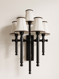 Flambeau Five-Light Wall Light, five matt black steel torch uprights with off-white fabric bell shades, front view