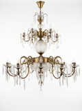 Durbar Two-Tier Brass and Crystal Chandelier, antique brass scroll arms, diamond-cut crystal globe and spear prisms, front view
