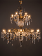 Durbar chandelier with all 21 candle lights on, the crystal sparkling
