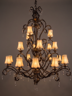 Toledo chandelier with all 21 shades lit warm amber