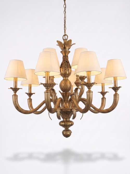 Acanthus Crown chandelier with all nine linen shades lit warm