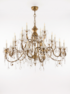 Firenze 30-Light Antique Gold and Crystal Chandelier, three tiers of antique gold scroll arms with crystal swags and drops, front view