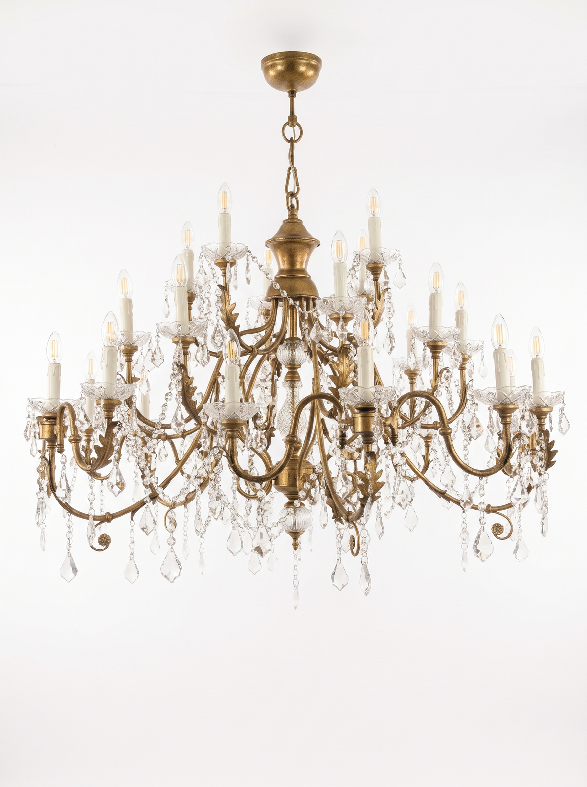 Firenze 30-Light Antique Gold and Crystal Chandelier, three tiers of antique gold scroll arms with crystal swags and drops, front view
