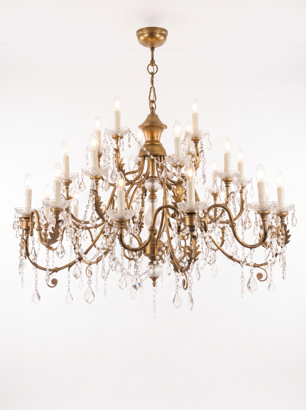 Firenze chandelier with all thirty candle lights on, the crystal sparkling