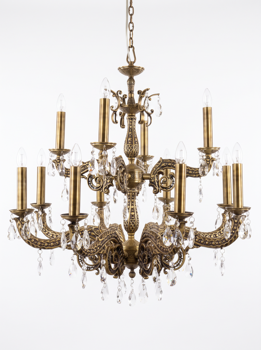 Granada 12-Light Cast Brass and Crystal Chandelier, heavy cast brass arms in pierced Moorish openwork with tall candle sleeves and crystal drops, front view