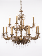 Granada chandelier with all twelve candle lights on, the crystal sparkling