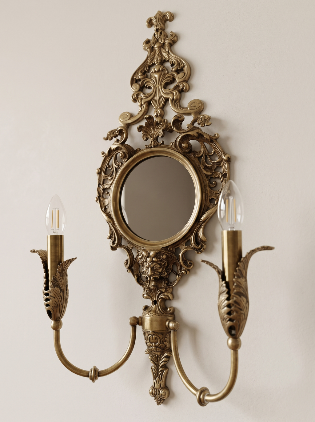 Rococo Mirror Double Wall Light three-quarter view showing the curved arms and acanthus candle cups