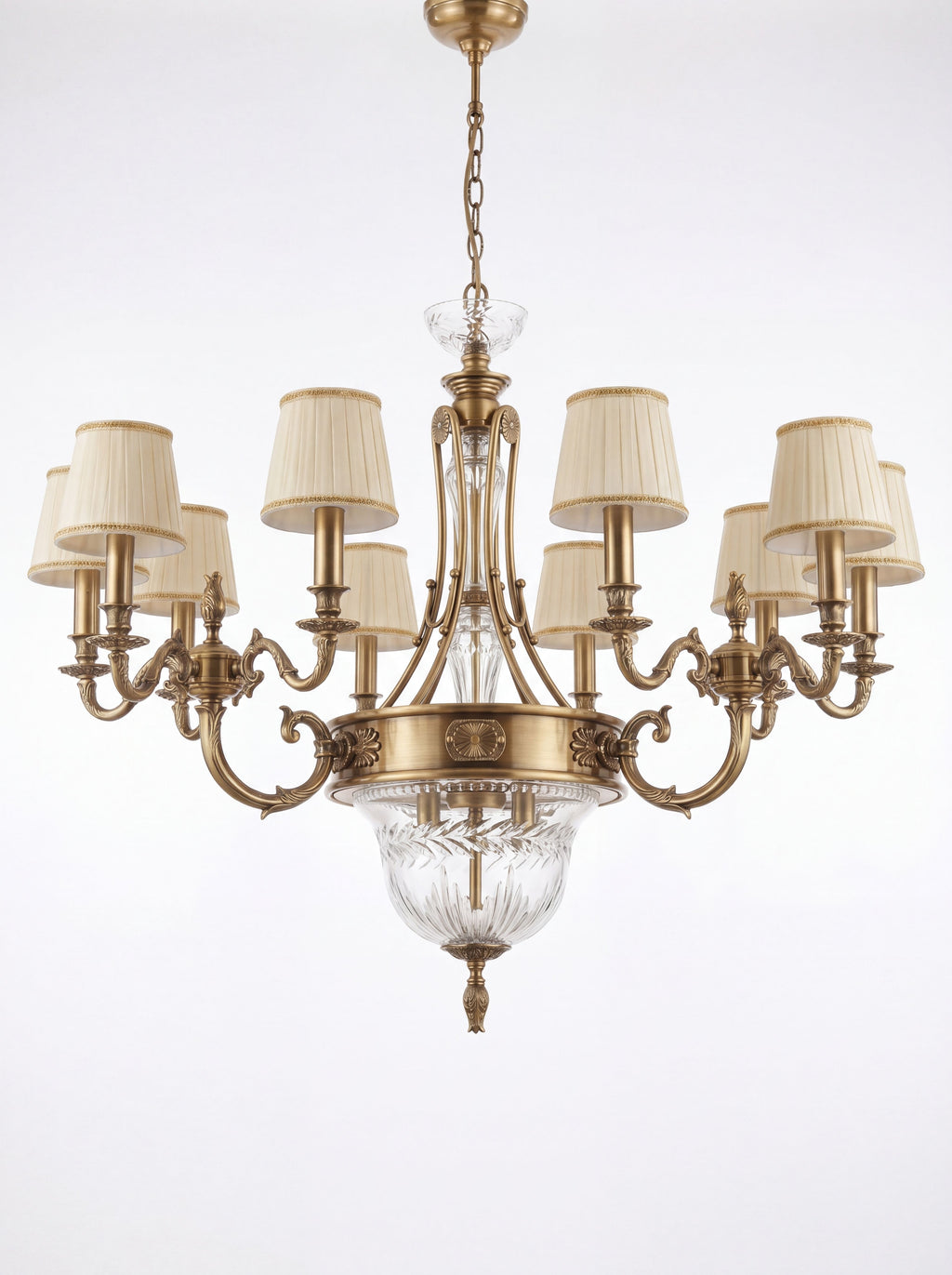 Scrolled Orb, a brass and fabric and crystal and glass chandelier, studio photograph on a white background