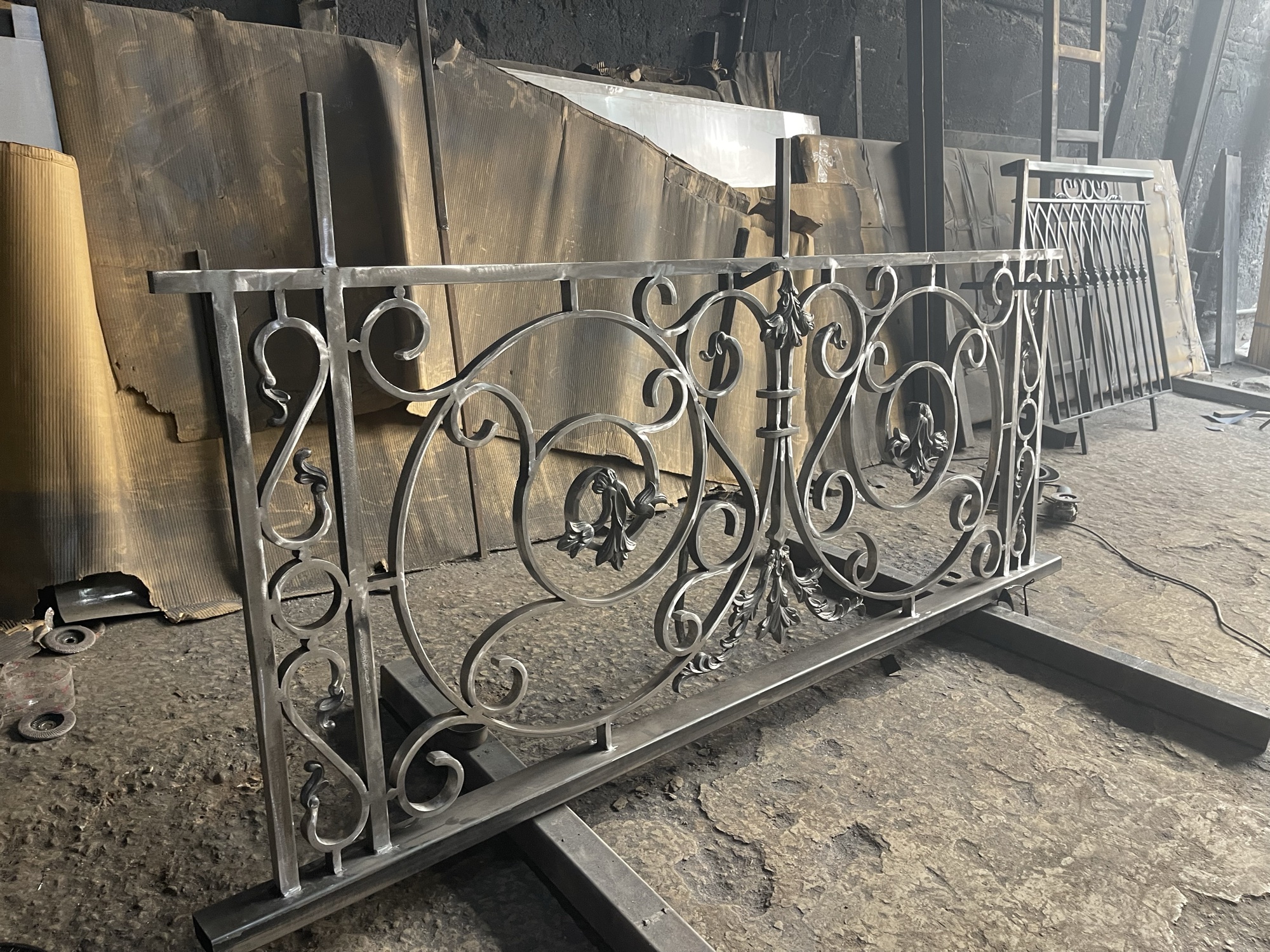 A hand-forged railing panel in the Delhi Brass workshop